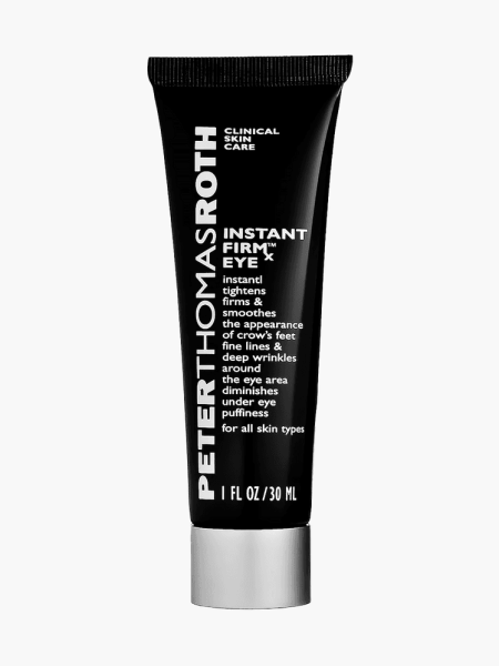 Instant Firmx Eye in branded black tube with silver cap on light gray background
