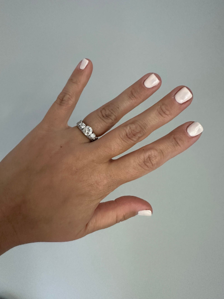 Image may contain Body Part Finger Hand Person Accessories Diamond Gemstone Jewelry and Skin
